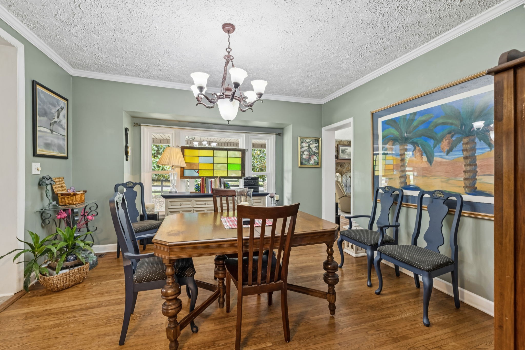 701 Hafner Road Charlotte, TN 37036 - Photo 23 of 52 a view of a dining room with furniture window and wooden floor