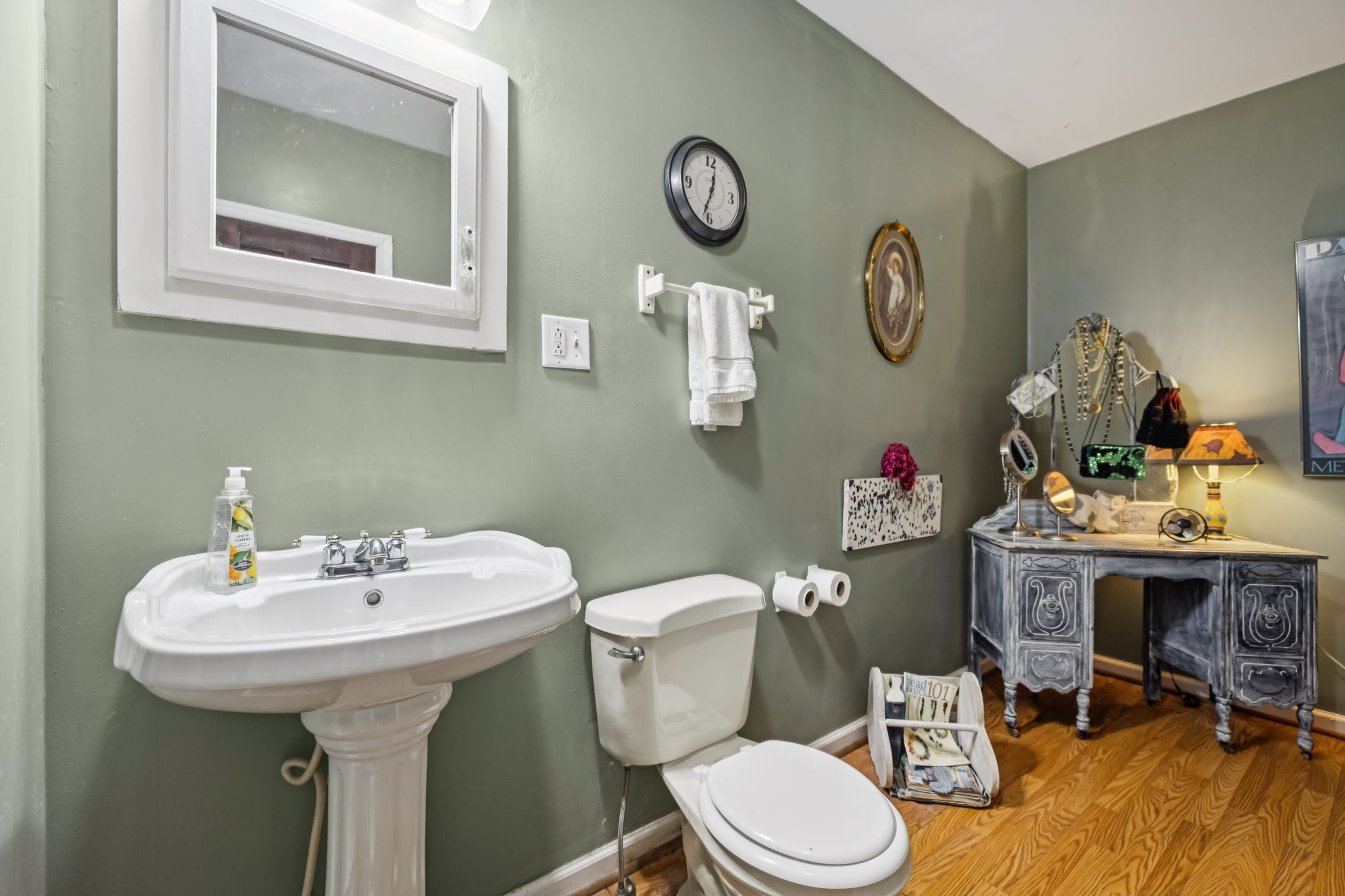 701 Hafner Road Charlotte, TN 37036 - Photo 29 of 52 a bathroom with a sink mirror and toilet