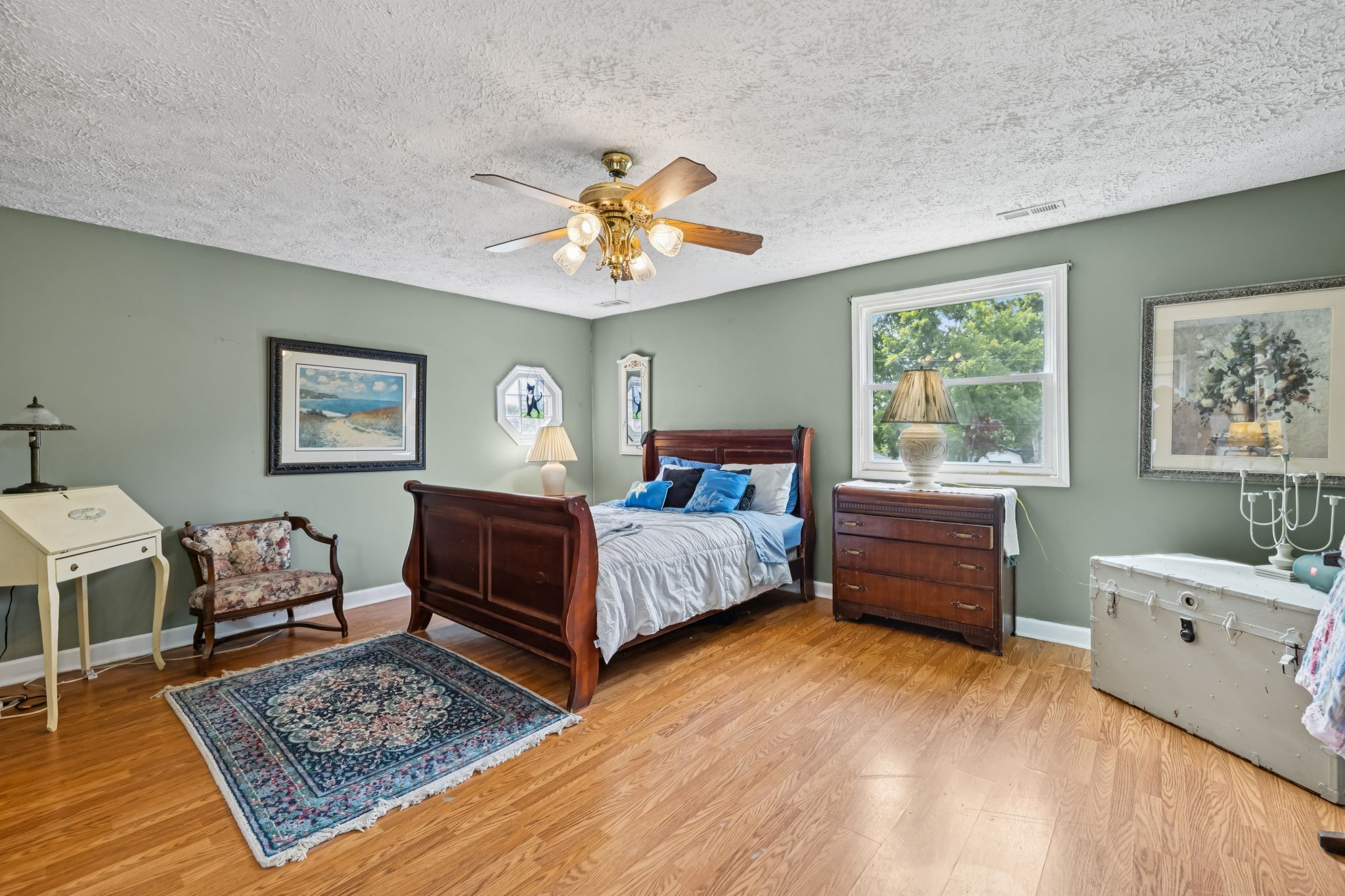 701 Hafner Road Charlotte, TN 37036 - Photo 35 of 52 a bedroom with a bed dresser and window