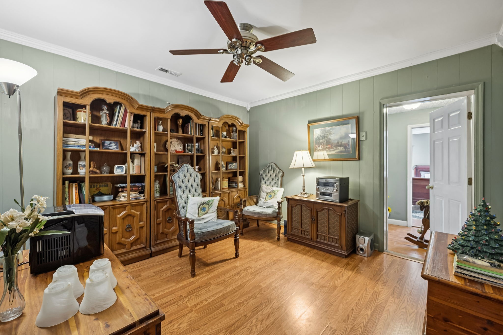 701 Hafner Road Charlotte, TN 37036 - Photo 37 of 52 a living room with furniture and wooden floor