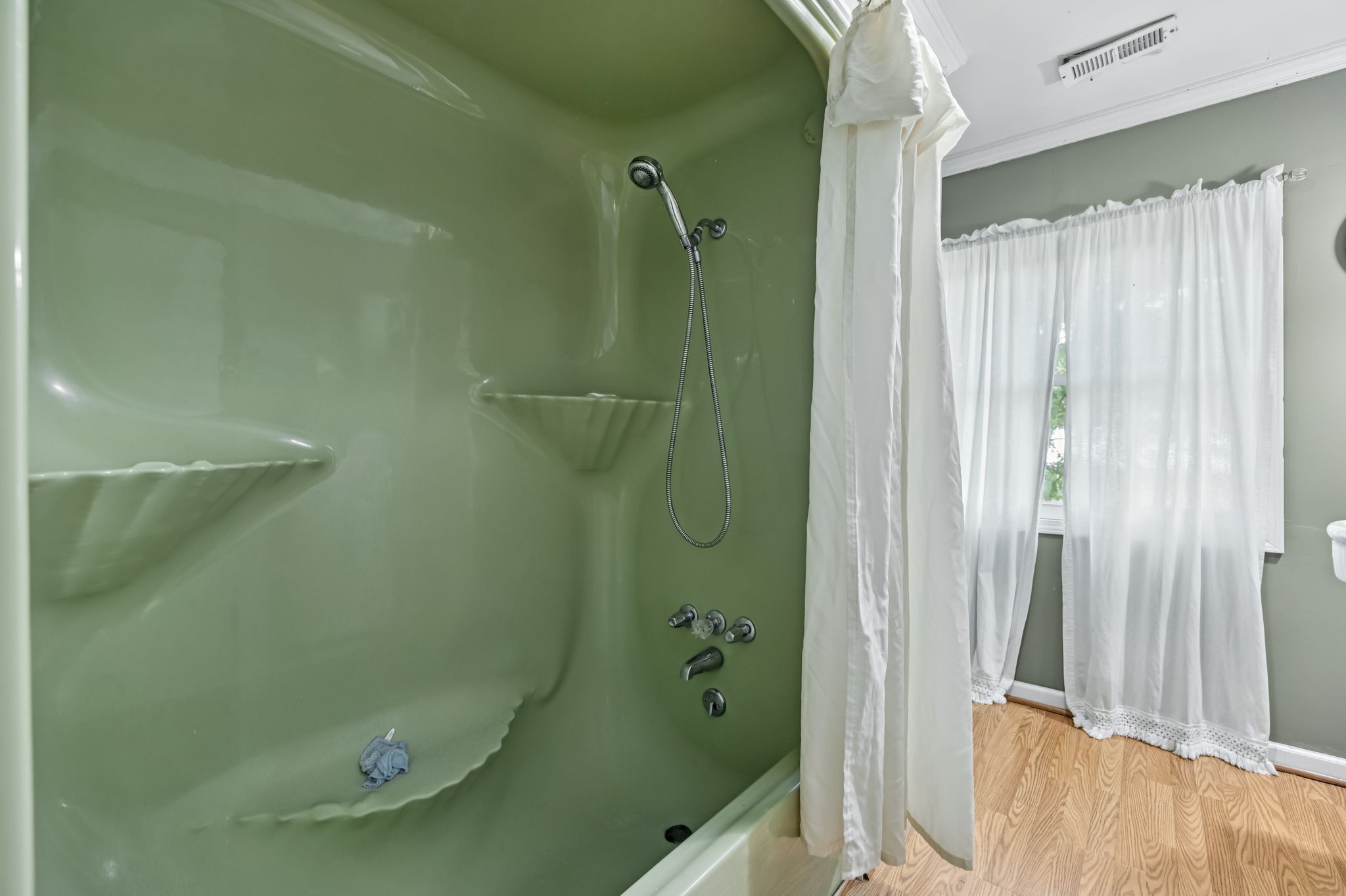 701 Hafner Road Charlotte, TN 37036 - Photo 39 of 52 a bathroom with a shower and a tub