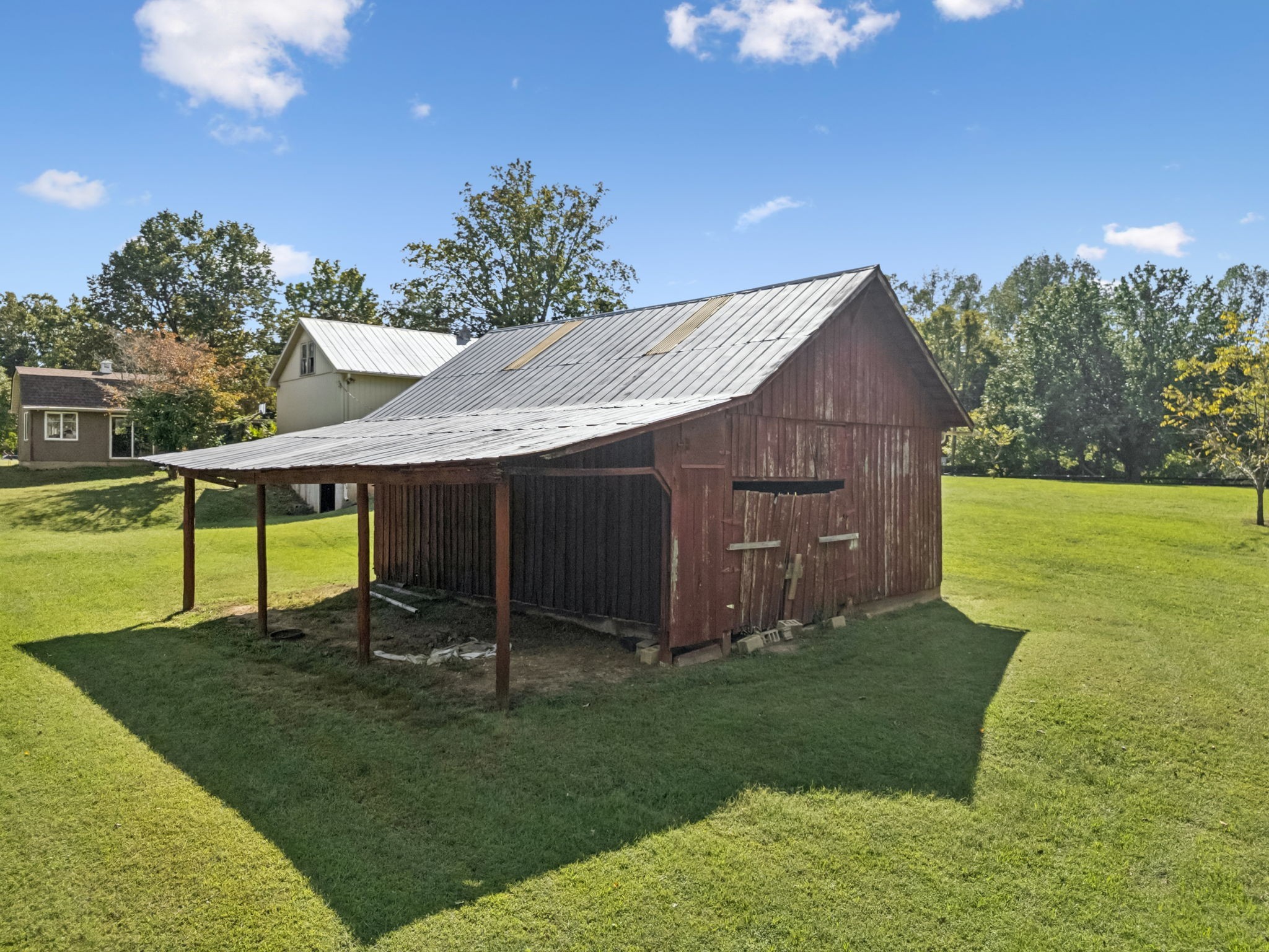 701 Hafner Road Charlotte, TN 37036 - Photo 43 of 52 a house view with a garden space