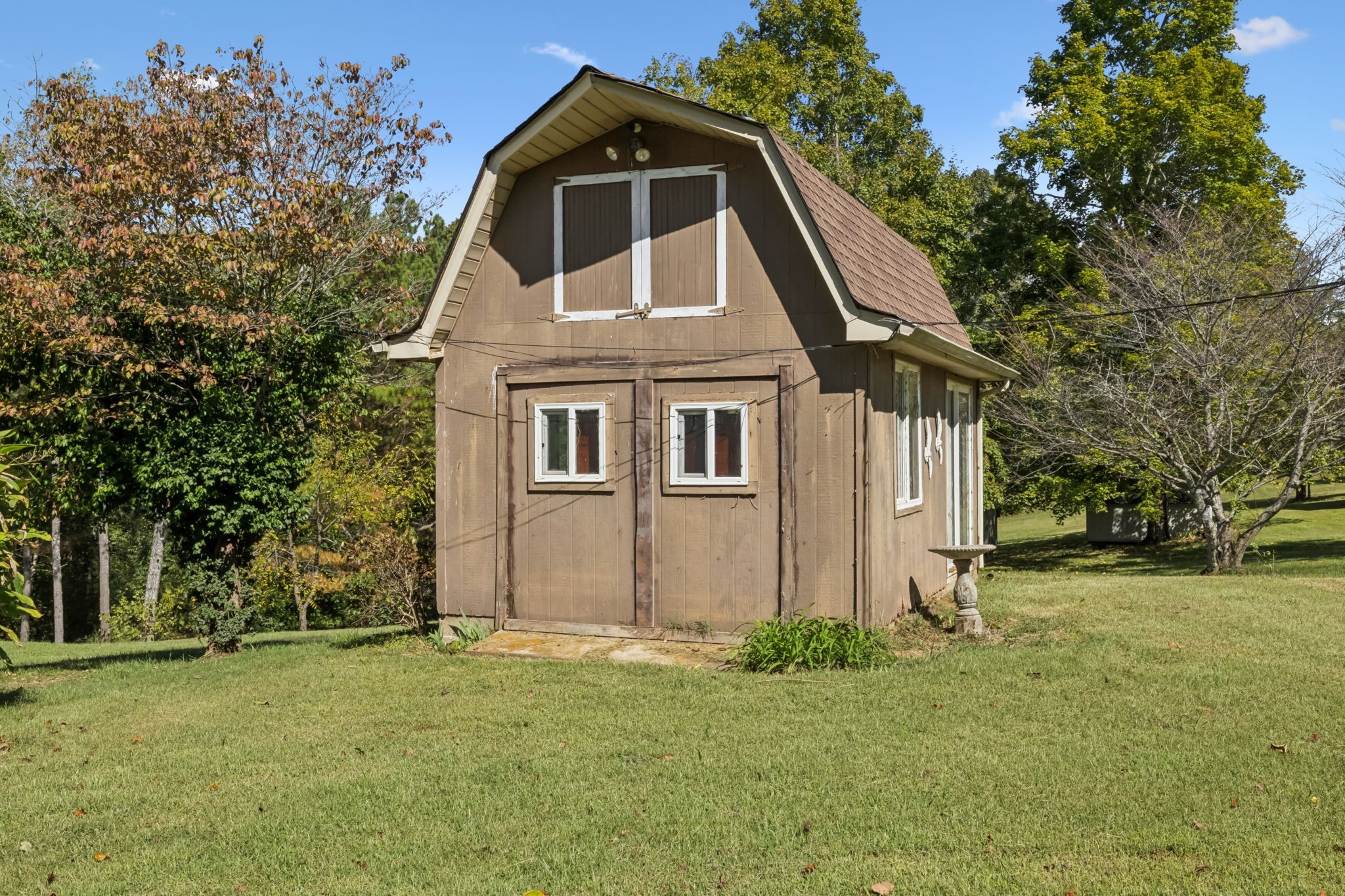 701 Hafner Road Charlotte, TN 37036 - Photo 44 of 52 a front view of a house with a yard