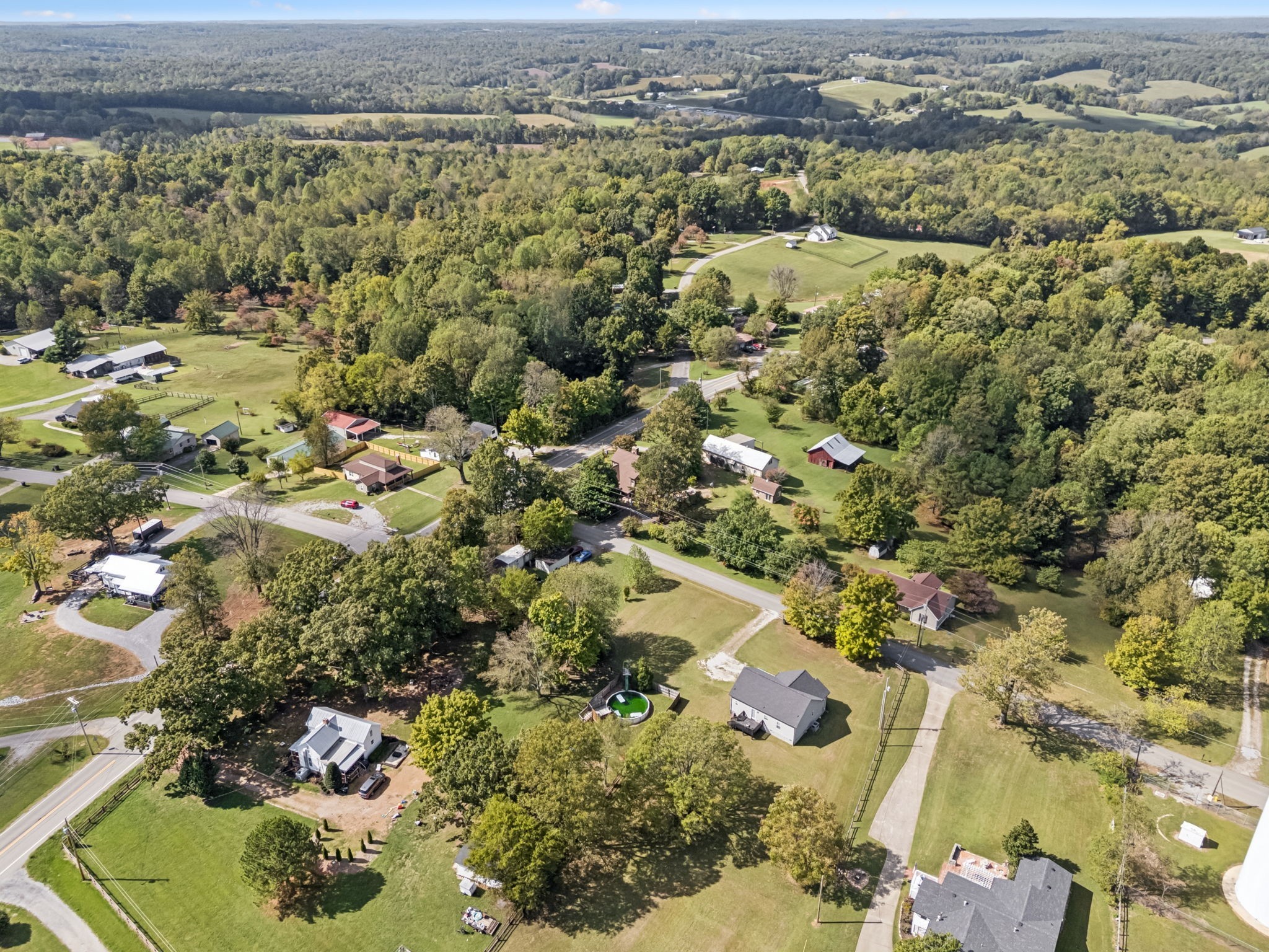 701 Hafner Road Charlotte, TN 37036 - Photo 46 of 52 an aerial view of a houses with a lake view