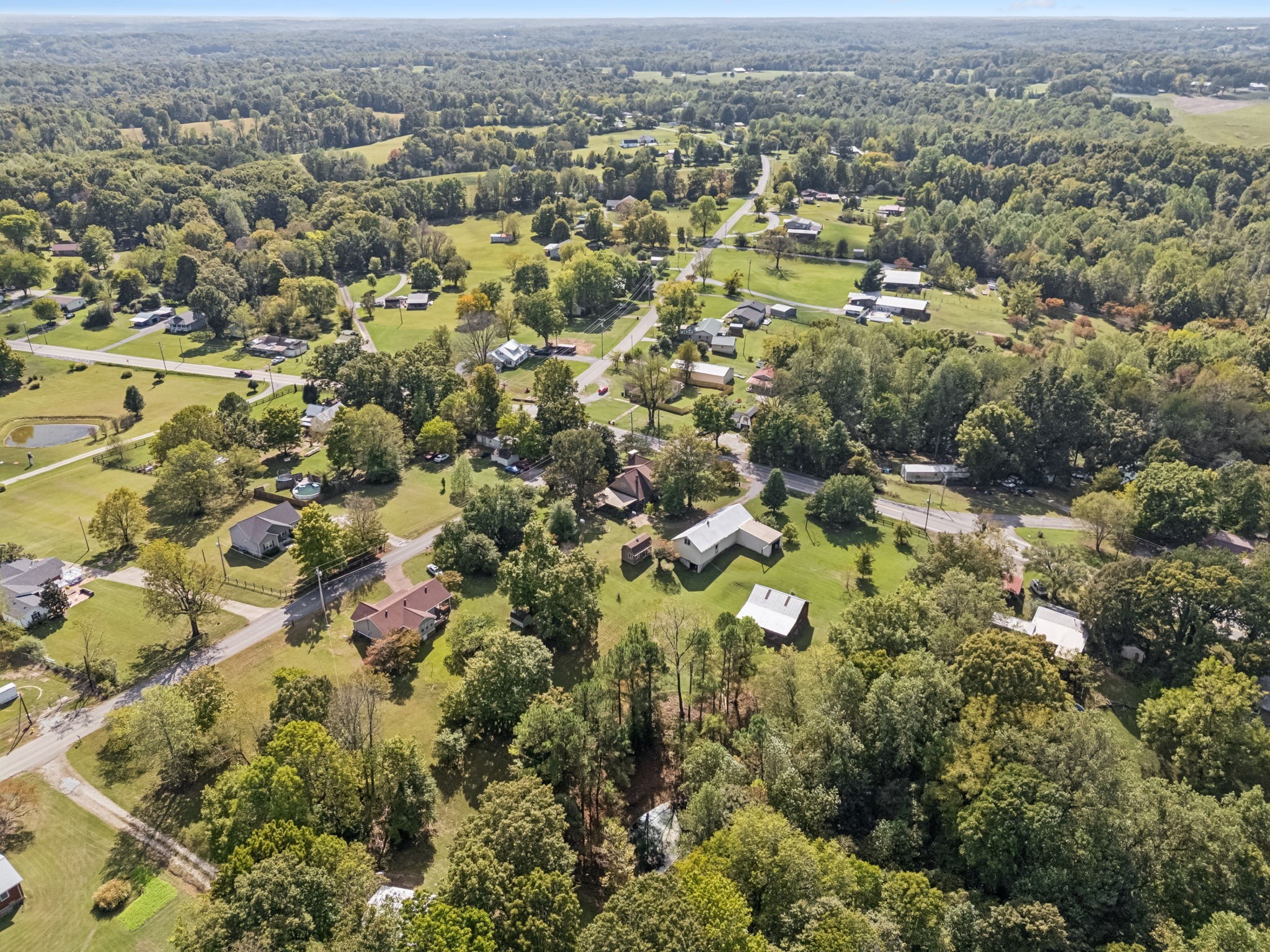 701 Hafner Road Charlotte, TN 37036 - Photo 48 of 52 an aerial view of residential houses with outdoor space