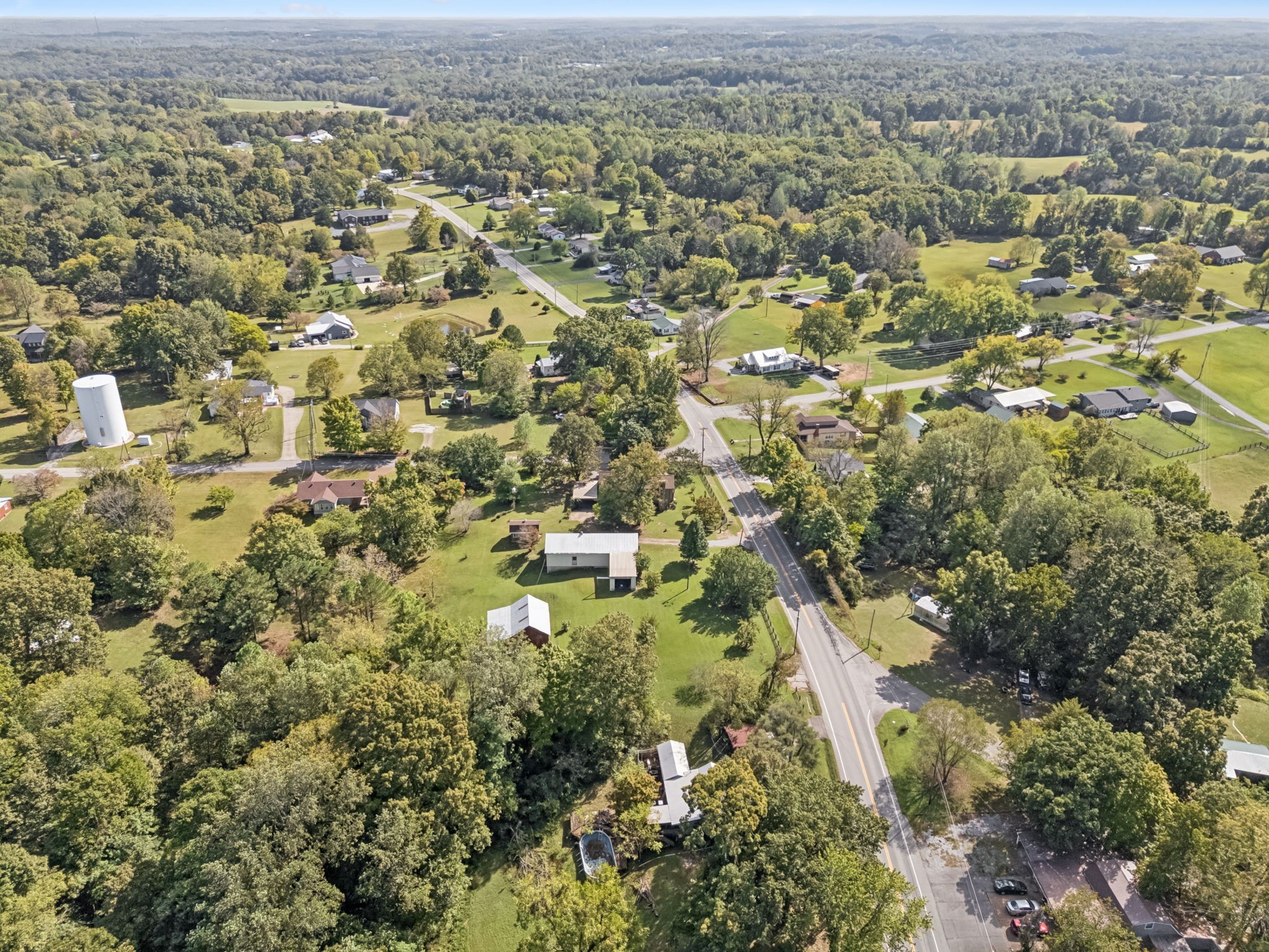 701 Hafner Road Charlotte, TN 37036 - Photo 49 of 52 an aerial view of residential houses with outdoor space and trees