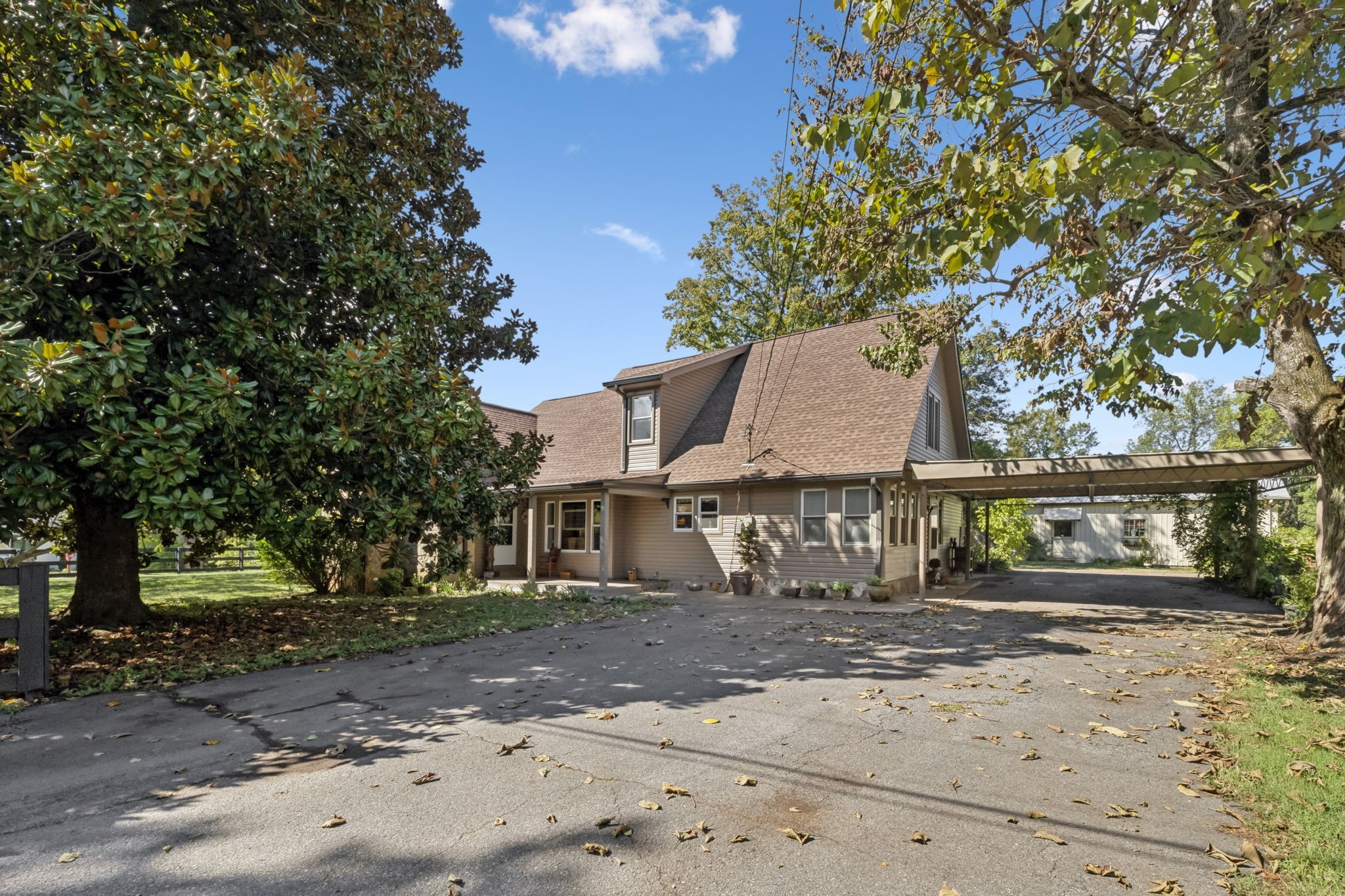 701 Hafner Road Charlotte, TN 37036 - Photo 5 of 52 a view of a house with a tree
