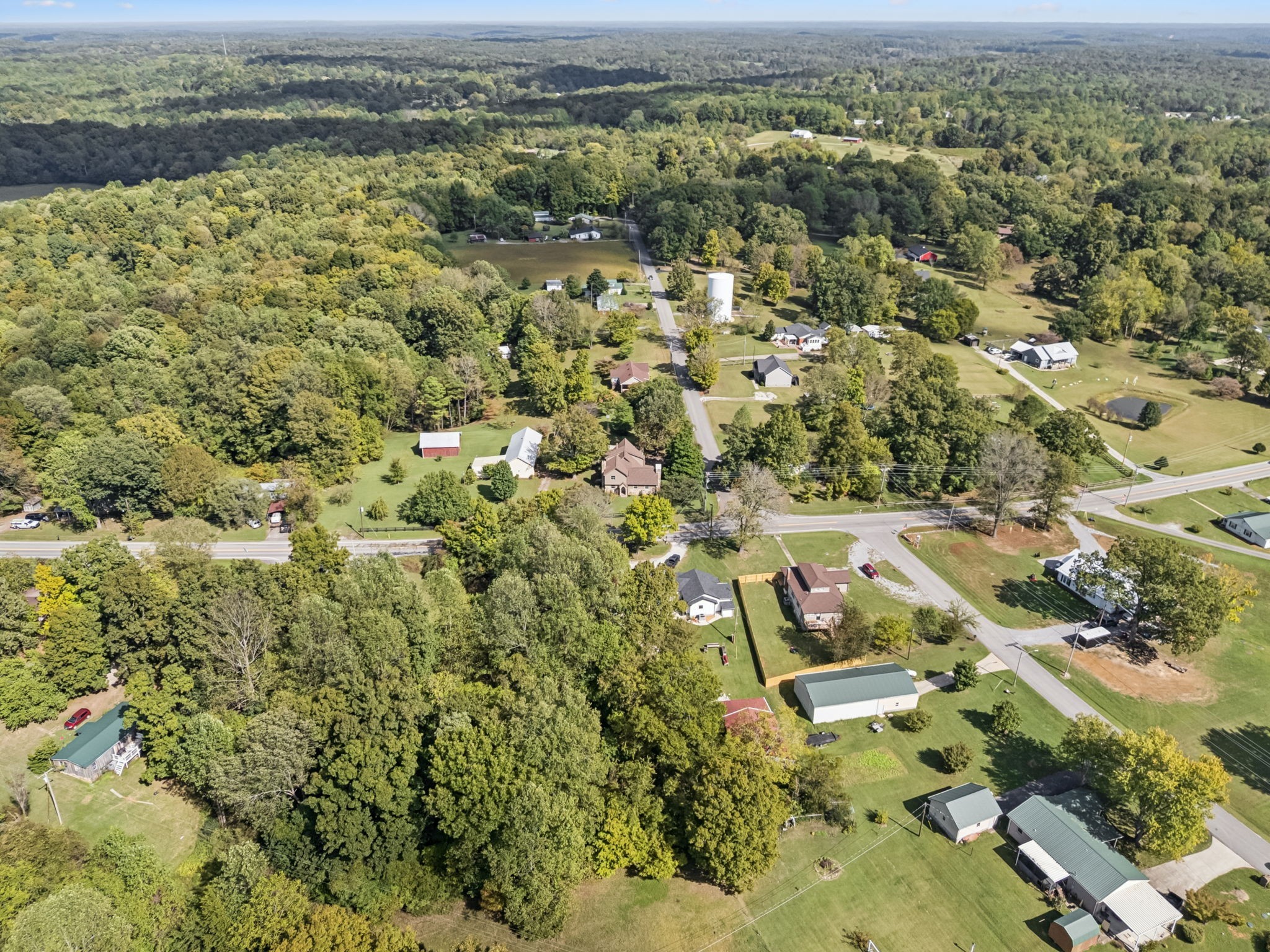 701 Hafner Road Charlotte, TN 37036 - Photo 51 of 52 an aerial view of residential houses with outdoor space