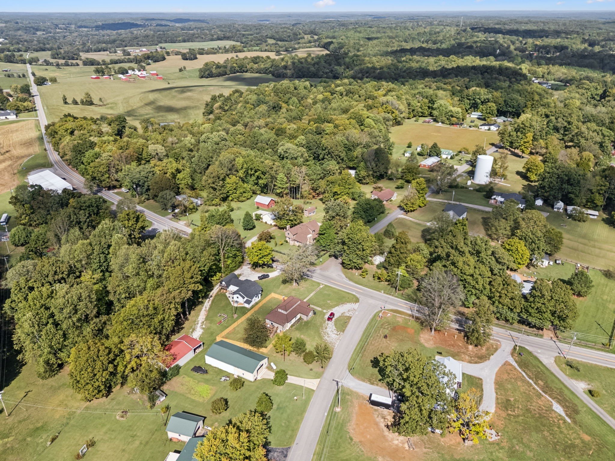 701 Hafner Road Charlotte, TN 37036 - Photo 52 of 52 an aerial view of residential houses with outdoor space