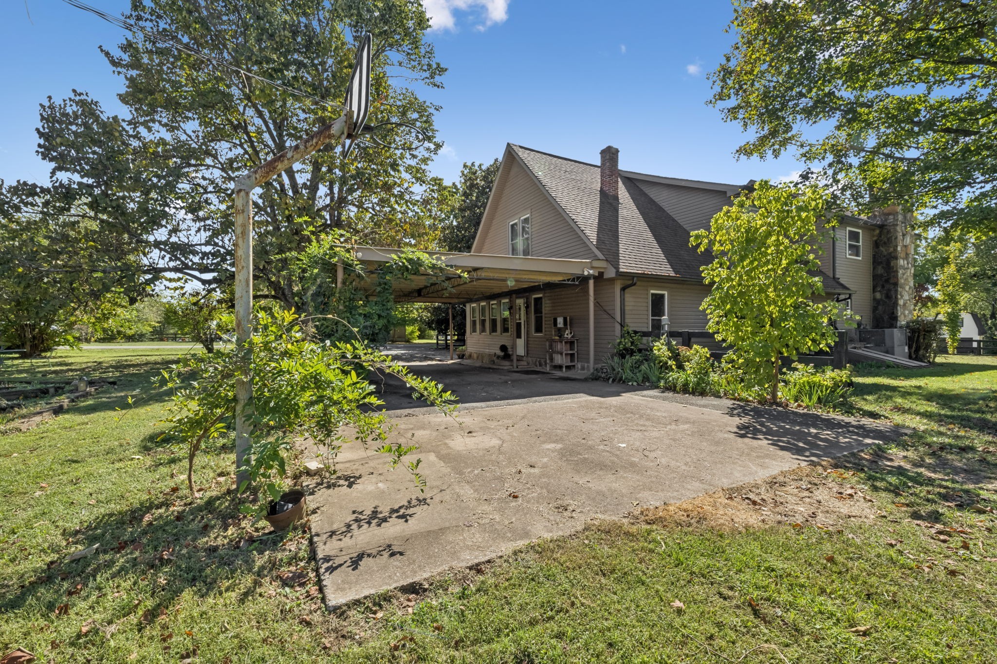 701 Hafner Road Charlotte, TN 37036 - Photo 7 of 52 a front view of a house with a yard