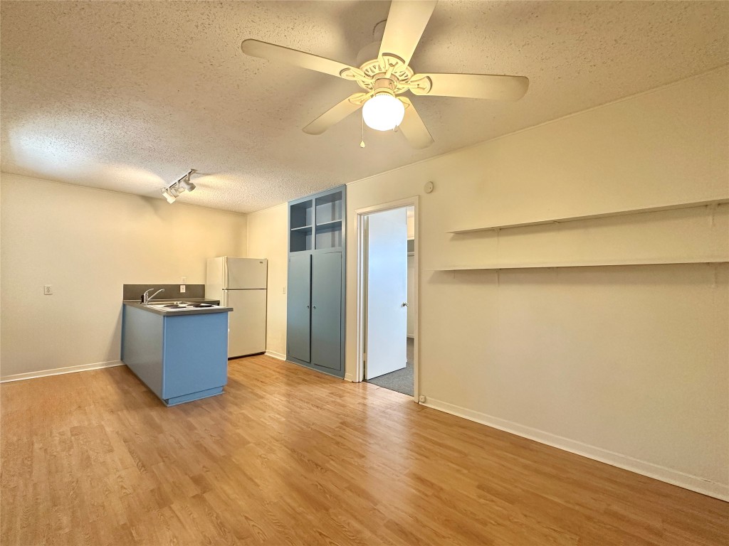 2711 Hemphill Park, Unit A Austin, TX 78705 - Photo 2 of 8 a area with wooden floor and window