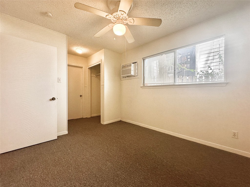 2711 Hemphill Park, Unit A Austin, TX 78705 - Photo 6 of 8 a view of an empty room with a window