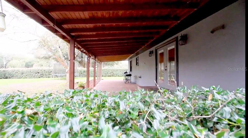 2700 Southeast 157th Lane Road Summerfield, FL 34491 - Photo 10 of 13 a view of a backyard of the house