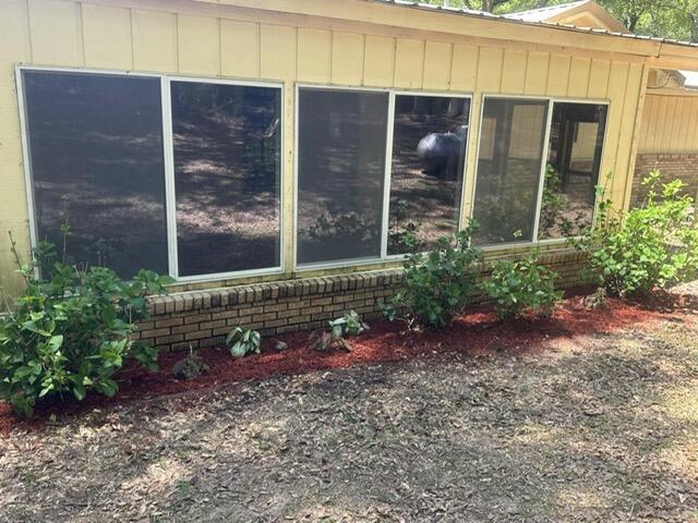 6359 Shangri La Road Crestview, FL 32539 - Photo 37 of 56 a view of a house with a yard