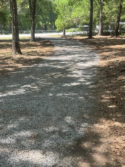 6359 Shangri La Road Crestview, FL 32539 - Photo 43 of 56 a view of a yard with a house
