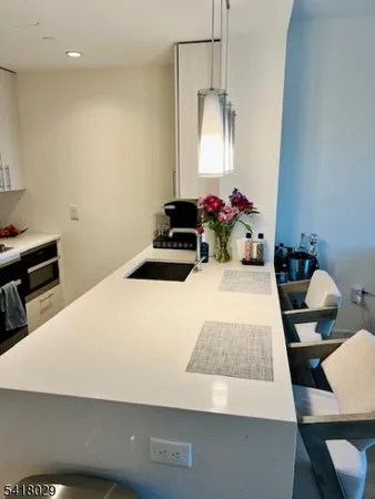 a room with a bed and a mirror