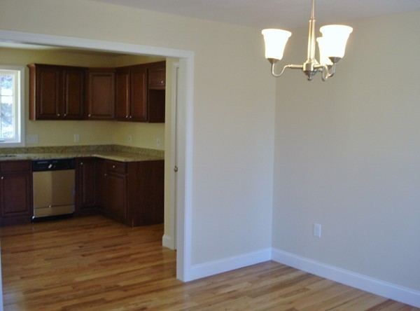 80 Chadwick Road Haverhill, MA 01835 - Photo 8 of 15 a kitchen with a sink and cabinets