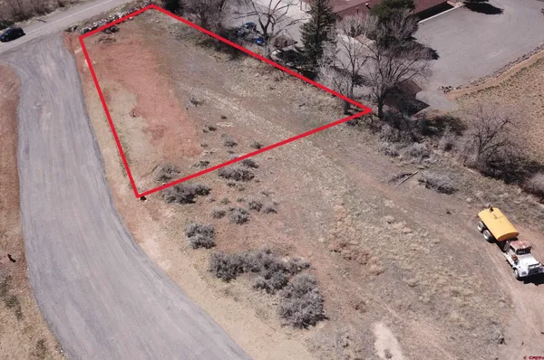 an aerial view of a city with lots of residential buildings