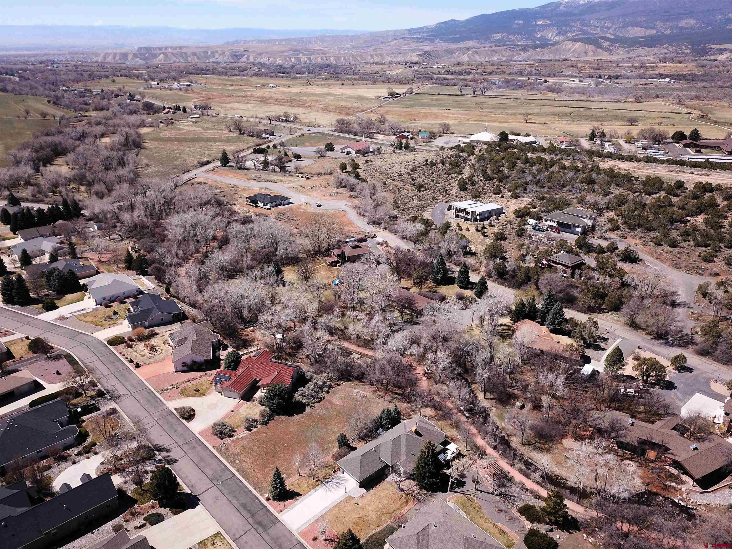 Tbd Southeast Tbd Se 3rd Street Cedaredge, CO 81413 - Photo 6 of 8 an aerial view of a city with lots of residential buildings