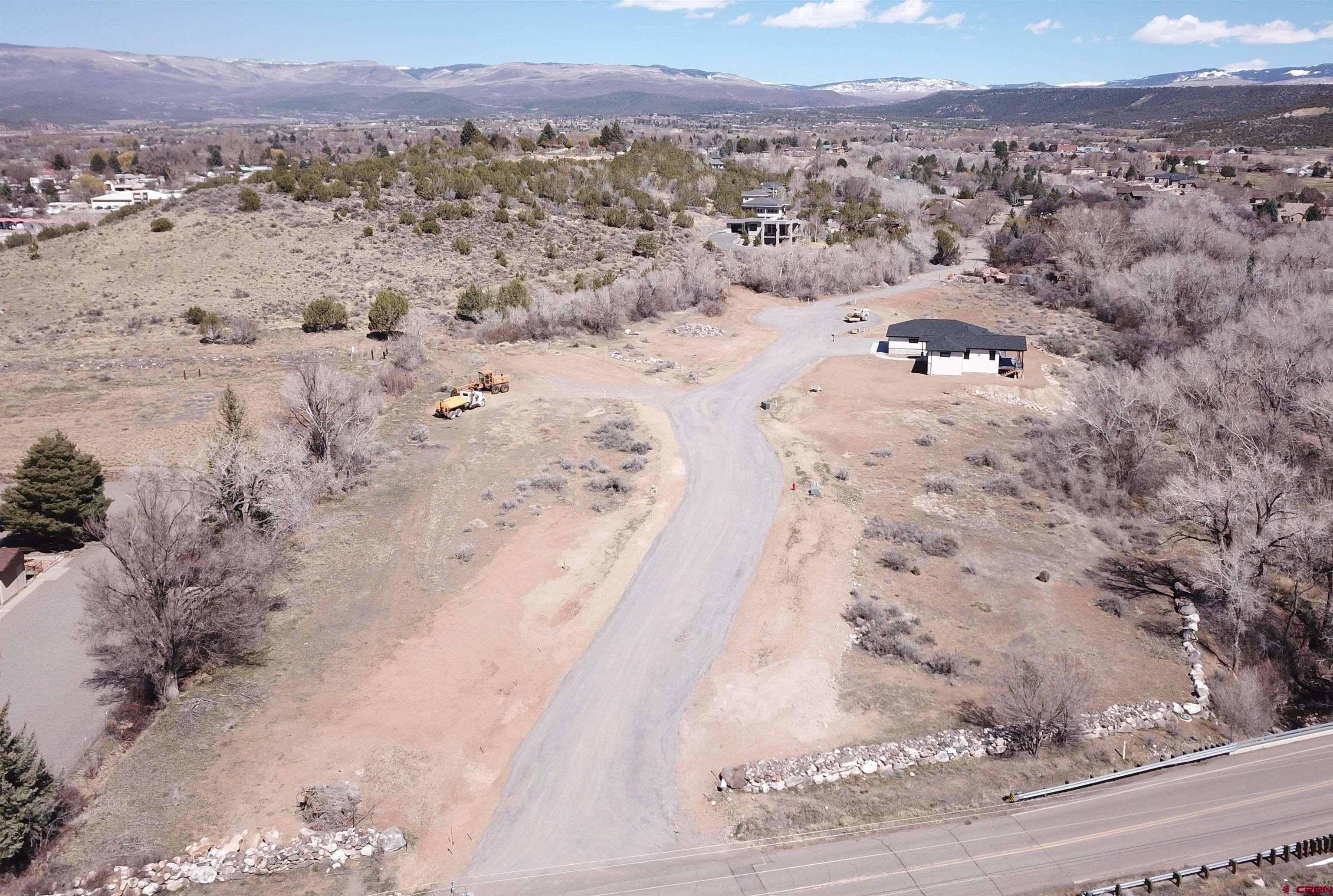 Tbd Southeast Tbd Se 3rd Street Cedaredge, CO 81413 - Photo 7 of 8 a view of a beach with a mountain view