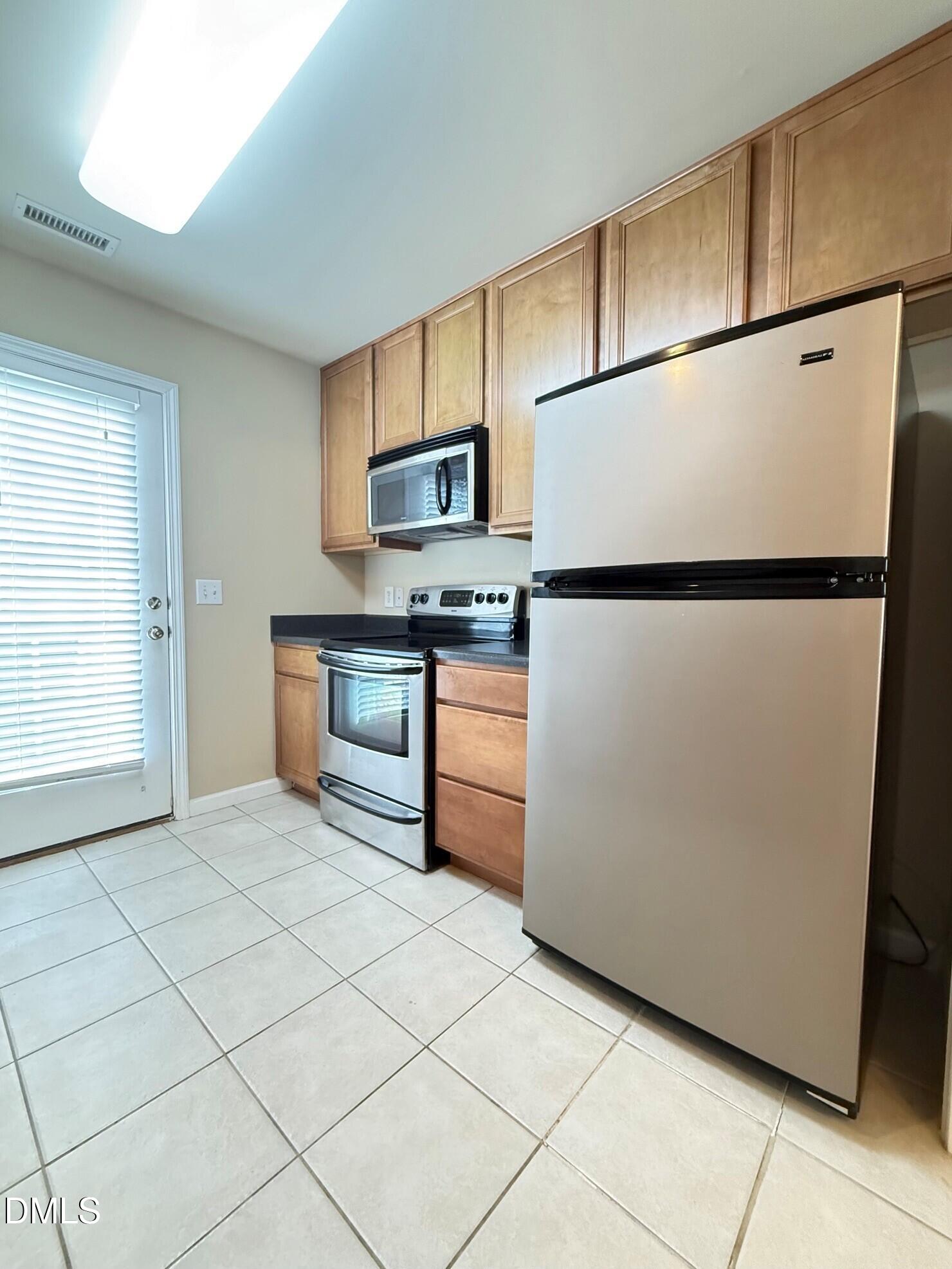 9911 Cleaver Court Raleigh, NC 27617 - Photo 7 of 27 Kitchen