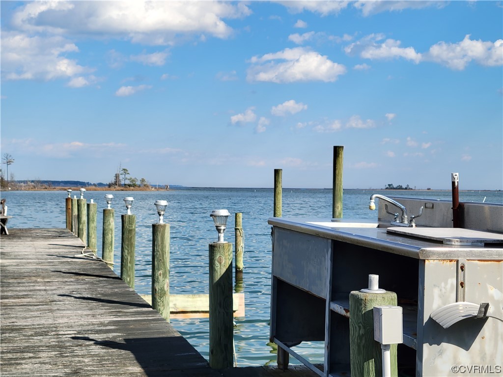 405 Locklies Creek Road Topping, VA 23169 - Photo 14 of 30 a view of a terrace with skyline