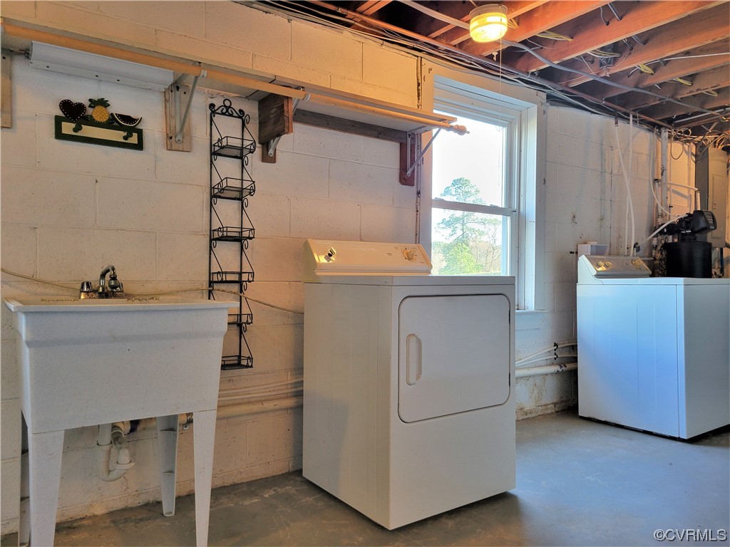 405 Locklies Creek Road Topping, VA 23169 - Photo 28 of 30 a utility room with dryer and washer