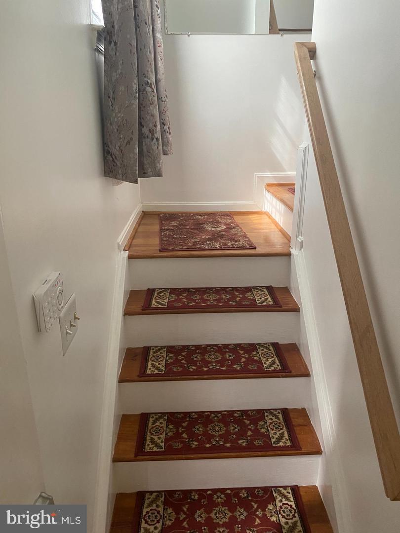 22985 Fleet Terrace Sterling, VA 20166 - Photo 3 of 14 a view of staircase