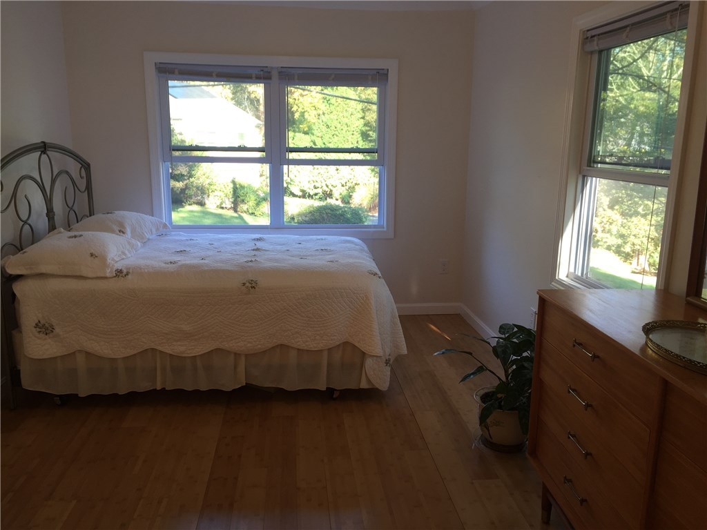 90 Progress Street Lincoln, RI 02865 - Photo 13 of 31 The Downstairs Bedroom Is Ideal For A First Floor Master Or For Your Overnight Guests. Large Windows Bathe The Room In Light. Radiant Heat Sits Under Bamboo Flooring.