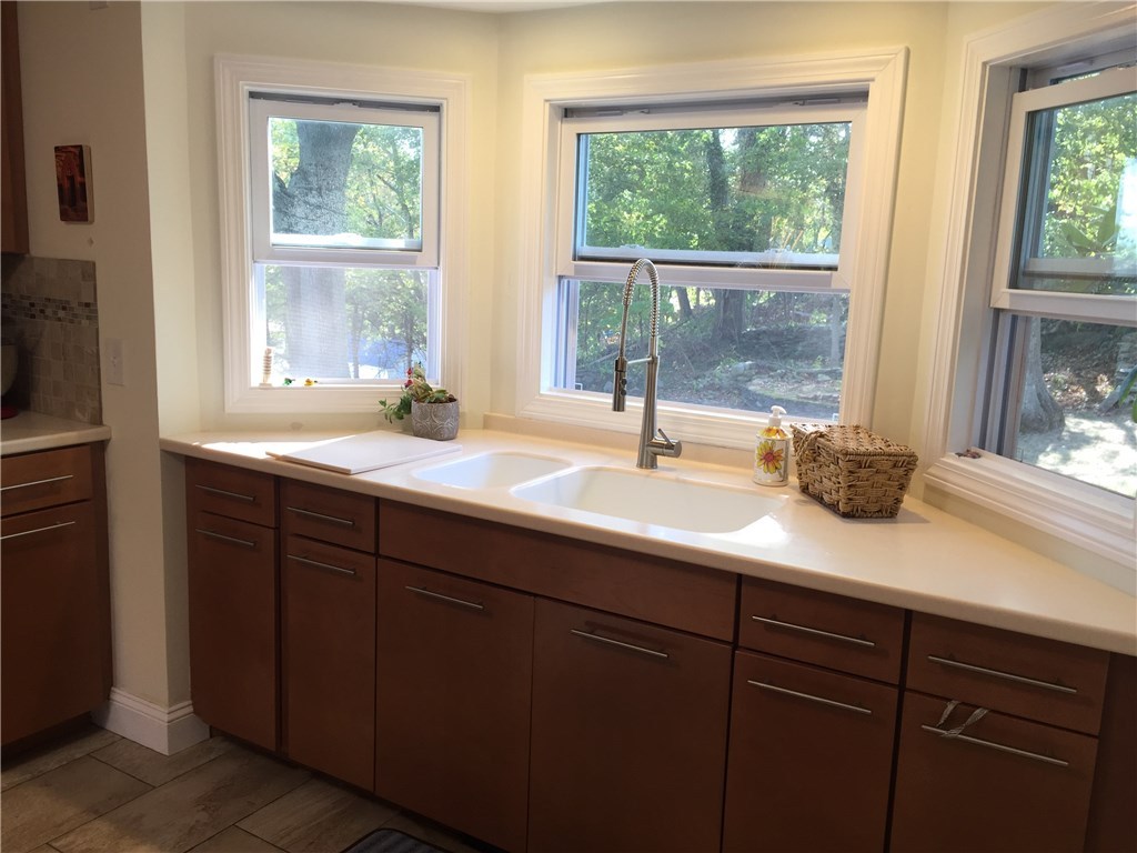 90 Progress Street Lincoln, RI 02865 - Photo 9 of 31 The Sink/Workstation Is Nicely Tucked Away And Has Triple Windows That Overlook The Yard.
