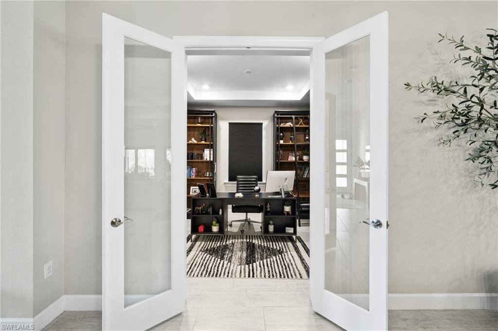 20734 Corkscrew Shores Boulevard Estero, FL 33928 - Photo 15 of 50 a view of a living room and a balcony