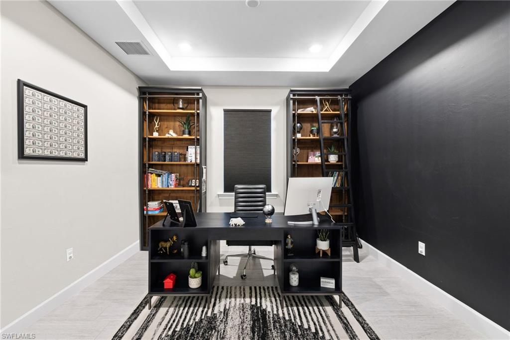 20734 Corkscrew Shores Boulevard Estero, FL 33928 - Photo 16 of 50 a view of a room with shelves