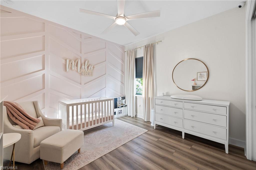 20734 Corkscrew Shores Boulevard Estero, FL 33928 - Photo 27 of 50 a living room with furniture and a window