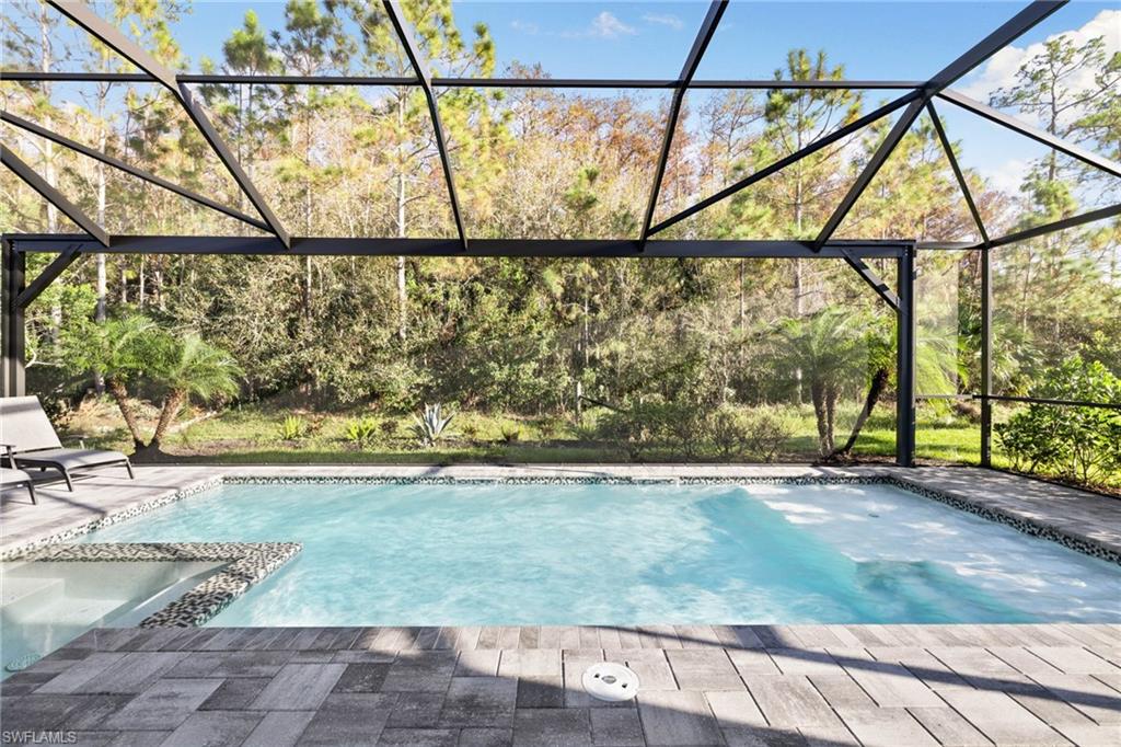 20734 Corkscrew Shores Boulevard Estero, FL 33928 - Photo 37 of 50 a view of outdoor space with a flat screen tv