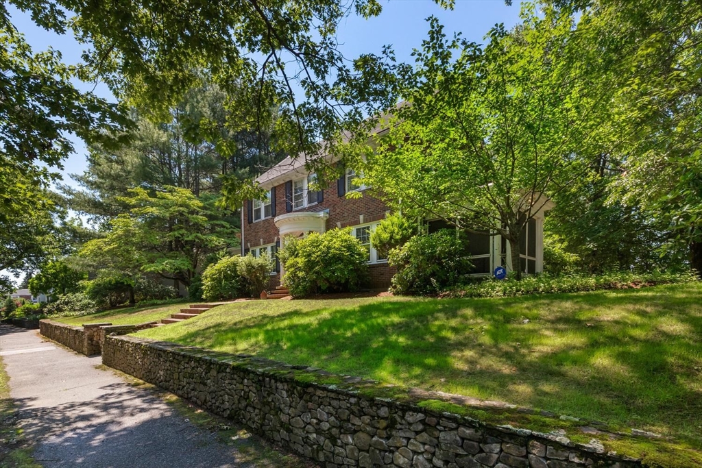 114 South Border Road Medford, MA 02155 - Photo 33 of 36 a view of a backyard with large trees