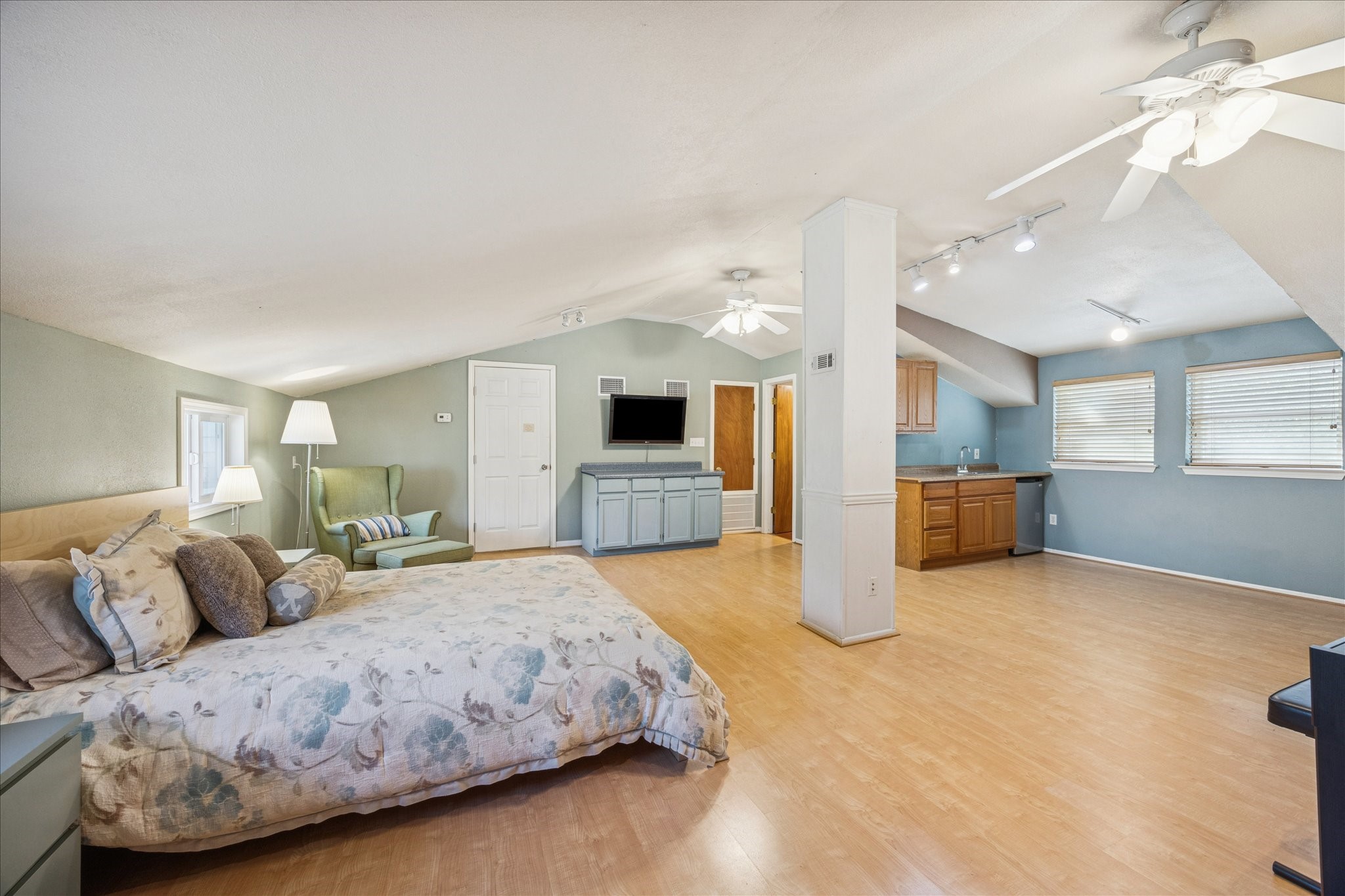 640 Piney Creek Road Bellville, TX 77418 - Photo 20 of 31 A spacious bonus space upstairs with private stairs down to the carport.