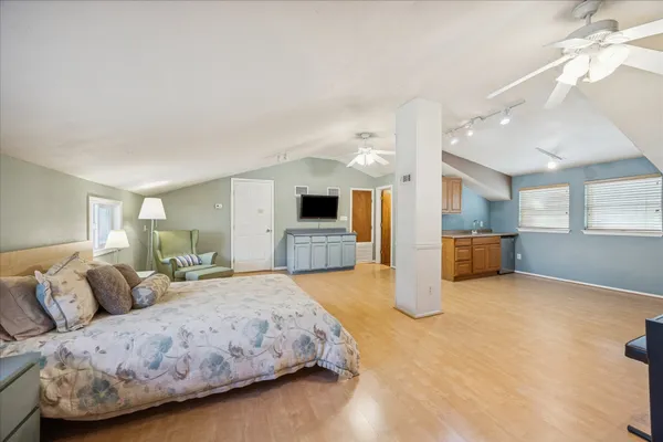 a kitchen with stainless steel appliances granite countertop a stove and a refrigerator