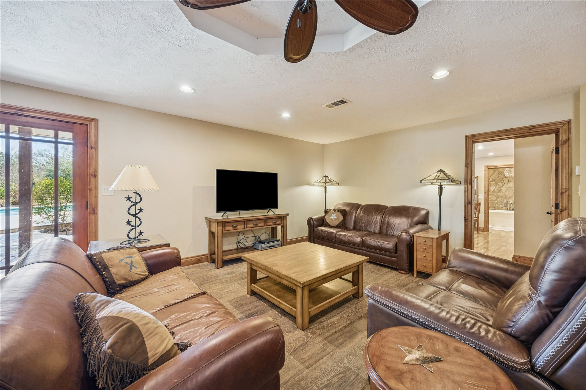 640 Piney Creek Road Bellville, TX 77418 - Photo 8 of 31 This spacious dining room offers a picture window overlooking the sparkling pool and is enhanced by a custom stone accent wall.