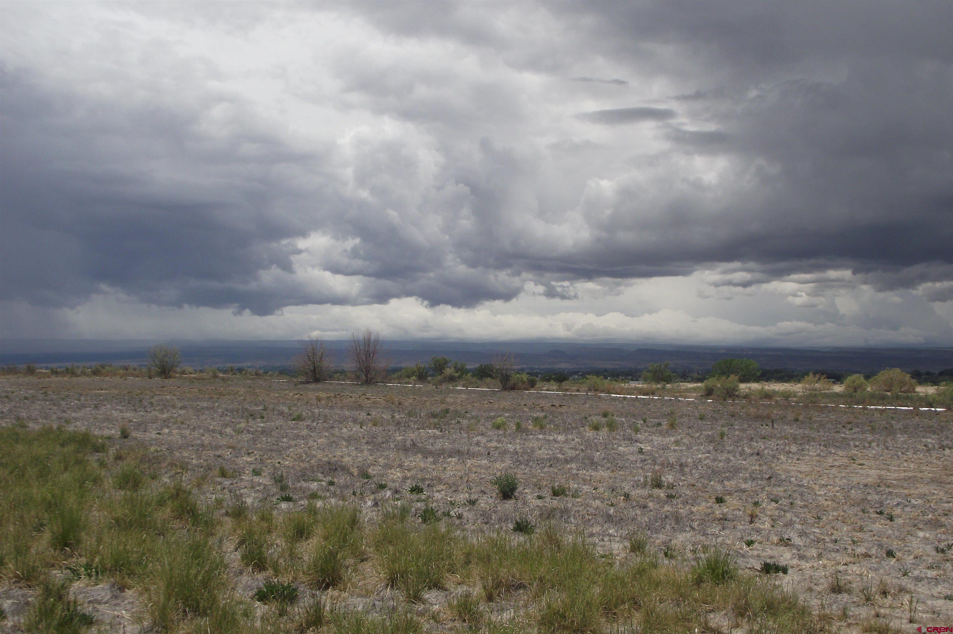 Lot 1-tbd Lot 1-tbd 1900th Road Delta, CO 81416 - Photo 14 of 31 a view of a dry yard with wooden fence