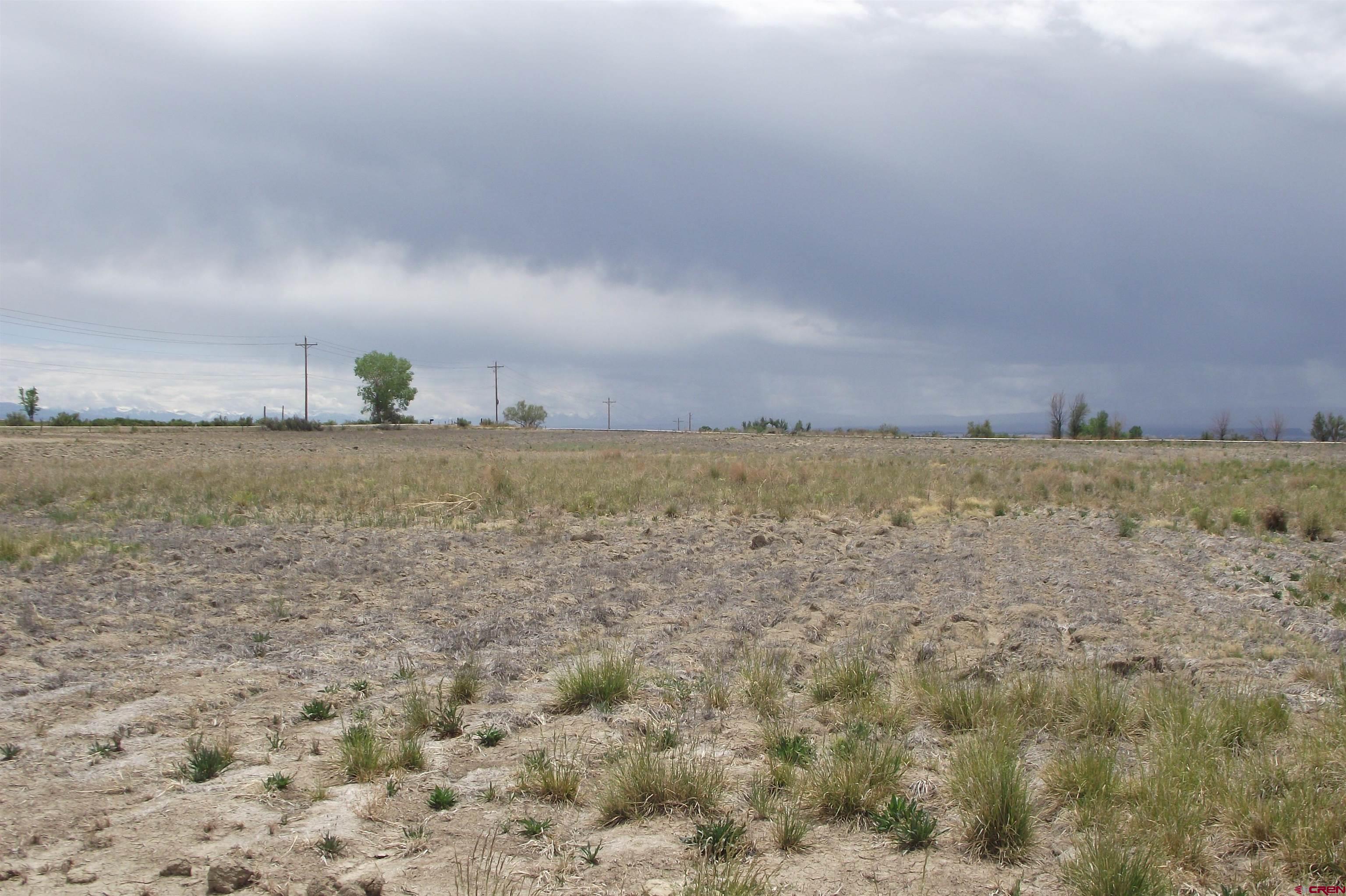 Lot 1-tbd Lot 1-tbd 1900th Road Delta, CO 81416 - Photo 16 of 31 a view of ocean and green field