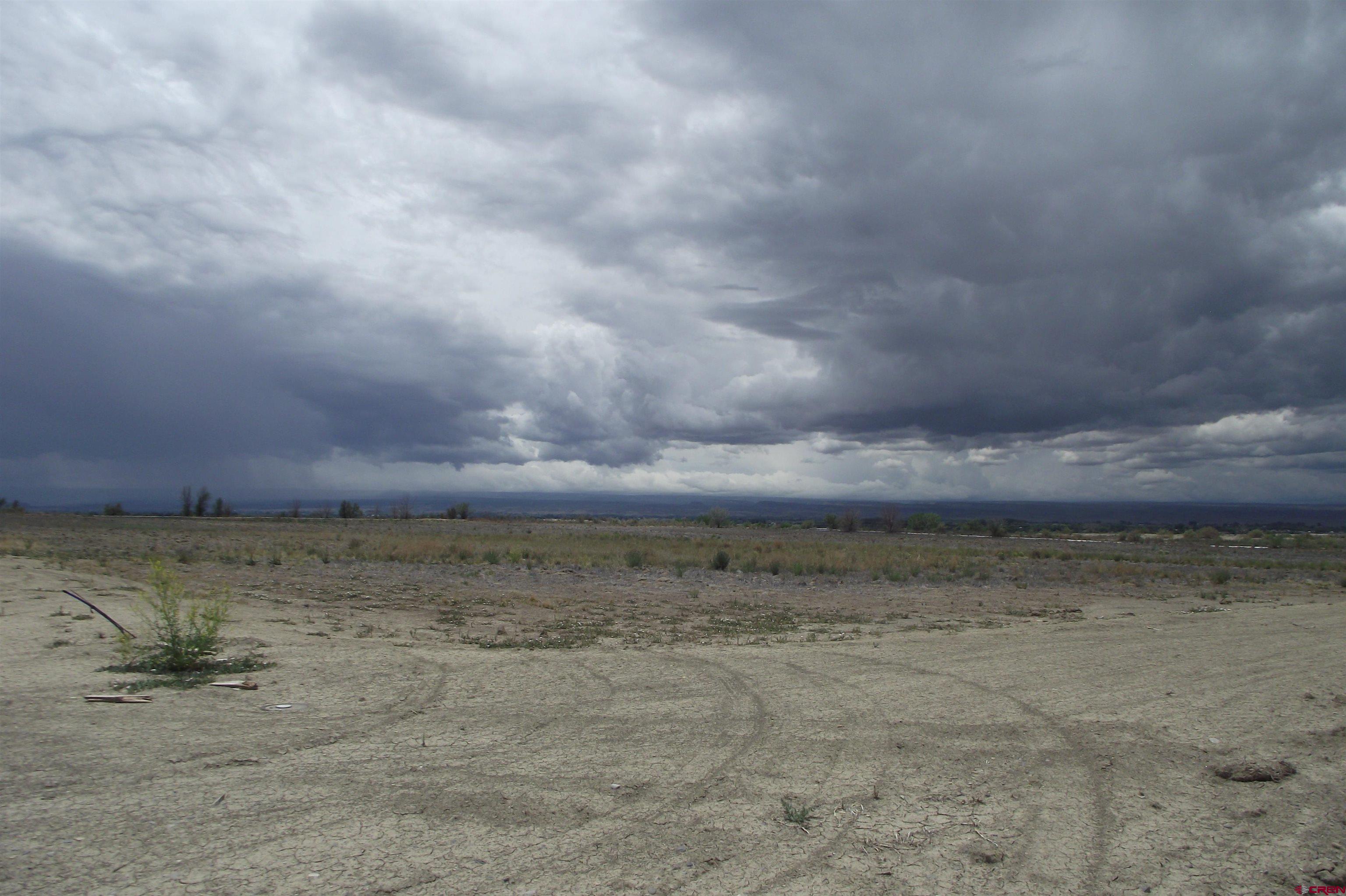 Lot 1-tbd Lot 1-tbd 1900th Road Delta, CO 81416 - Photo 7 of 31 a view of a dry yard with wooden fence