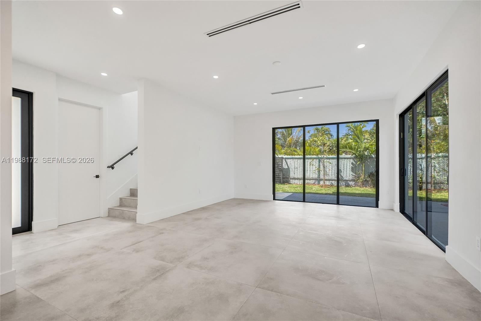 2421 Southwest 16th Terrace Miami, FL 33145 - Photo 14 of 37 a view of an empty room with a window