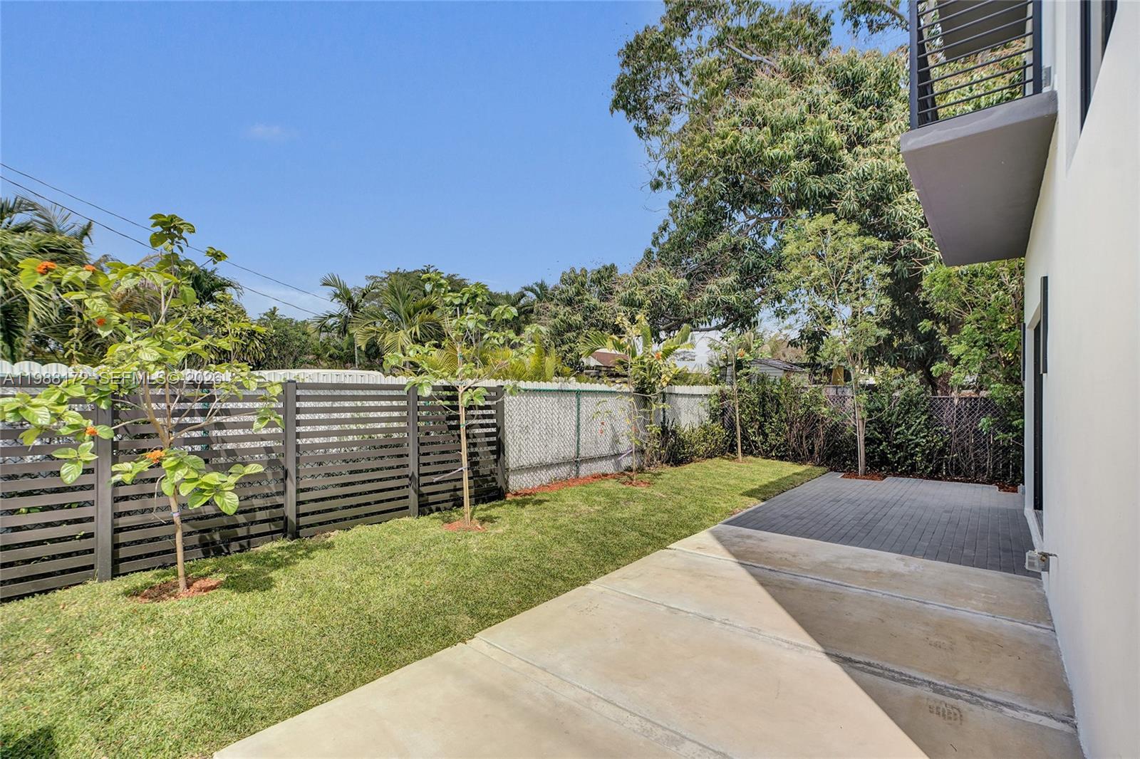2421 Southwest 16th Terrace Miami, FL 33145 - Photo 30 of 37 a garden view with a seating space
