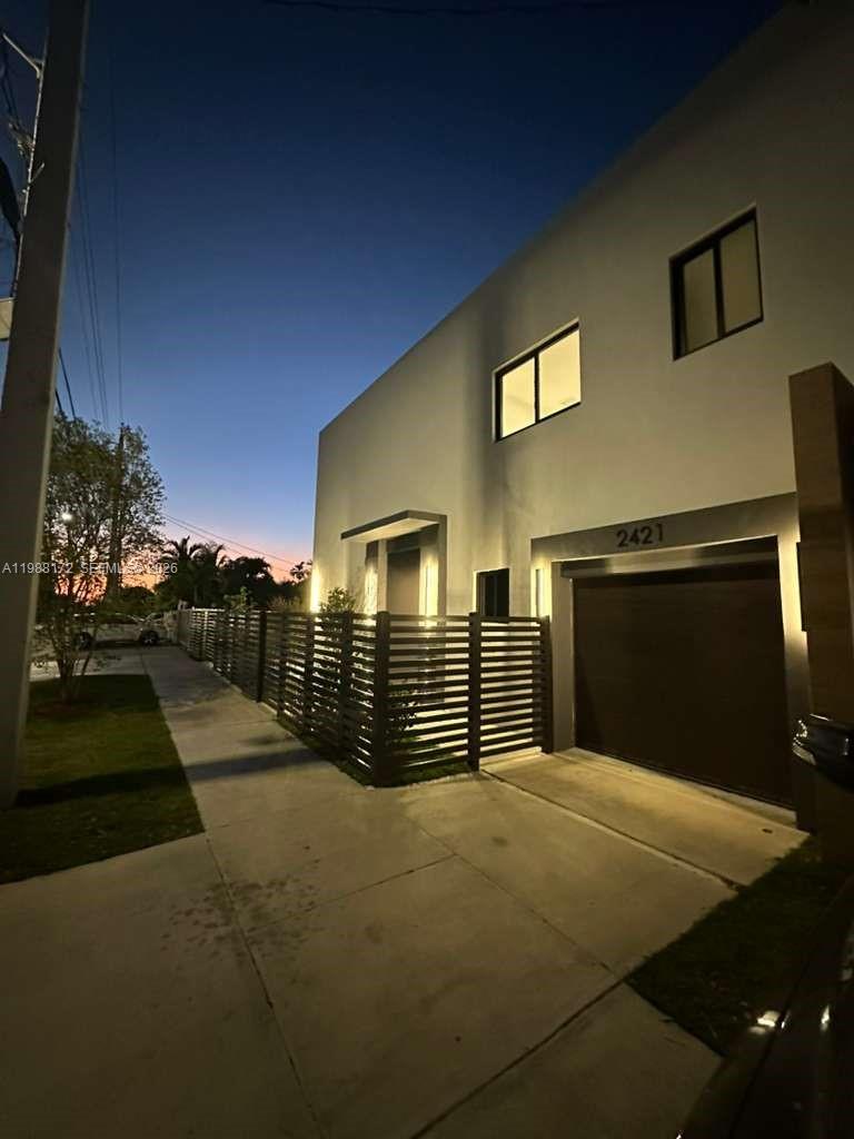 2421 Southwest 16th Terrace Miami, FL 33145 - Photo 37 of 37 a front view of a house with basket ball court