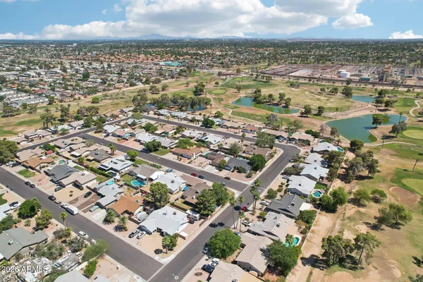 an aerial view of residential building with parking space