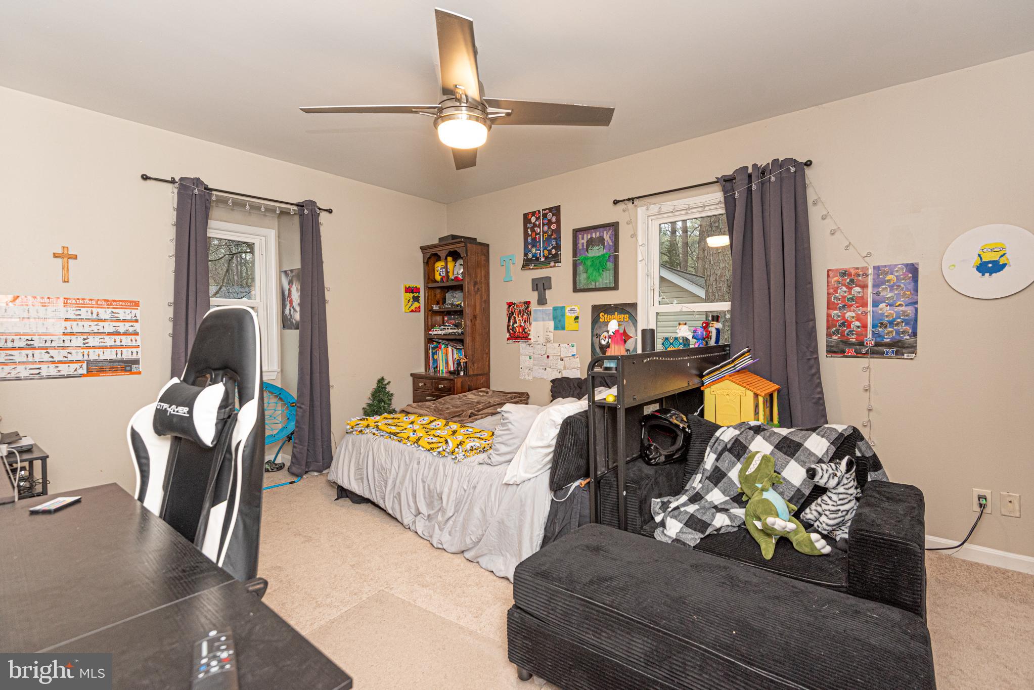 33 Liberty Street Ocean Pines, MD 21811 - Photo 24 of 30 a bedroom with furniture and a large window