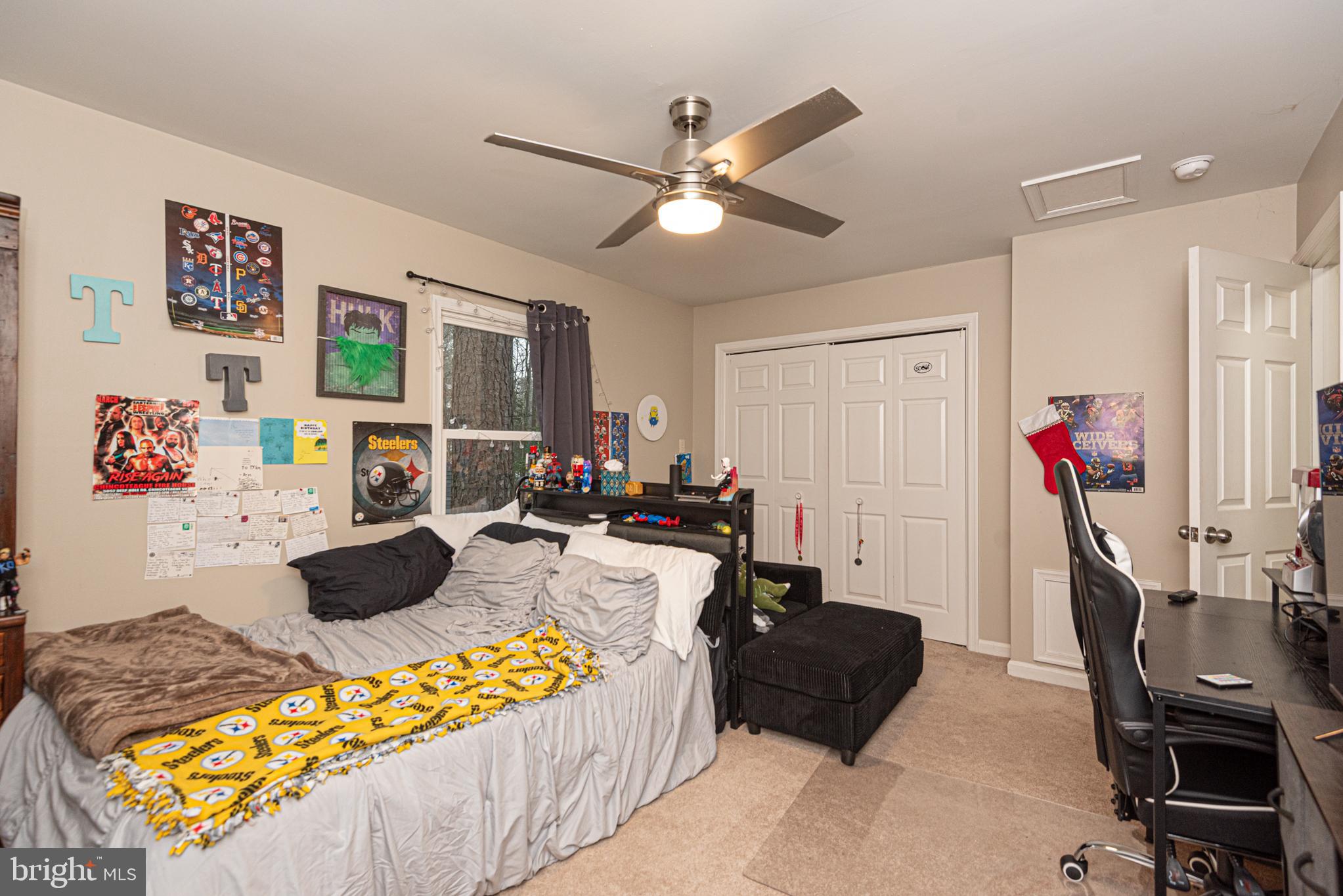 33 Liberty Street Ocean Pines, MD 21811 - Photo 25 of 30 a living room with furniture and a flat screen tv