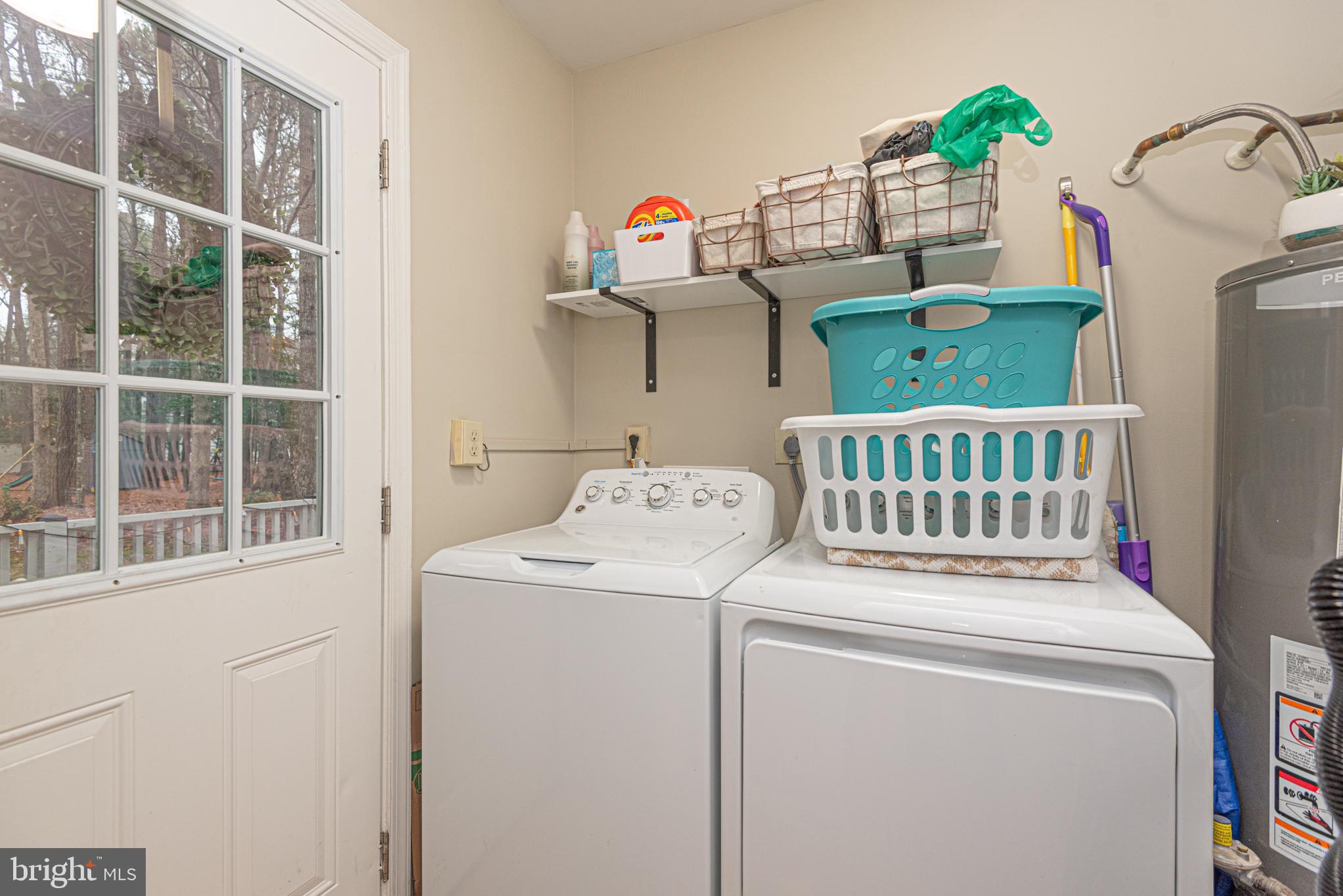 33 Liberty Street Ocean Pines, MD 21811 - Photo 26 of 30 a utility room with dryer and washer
