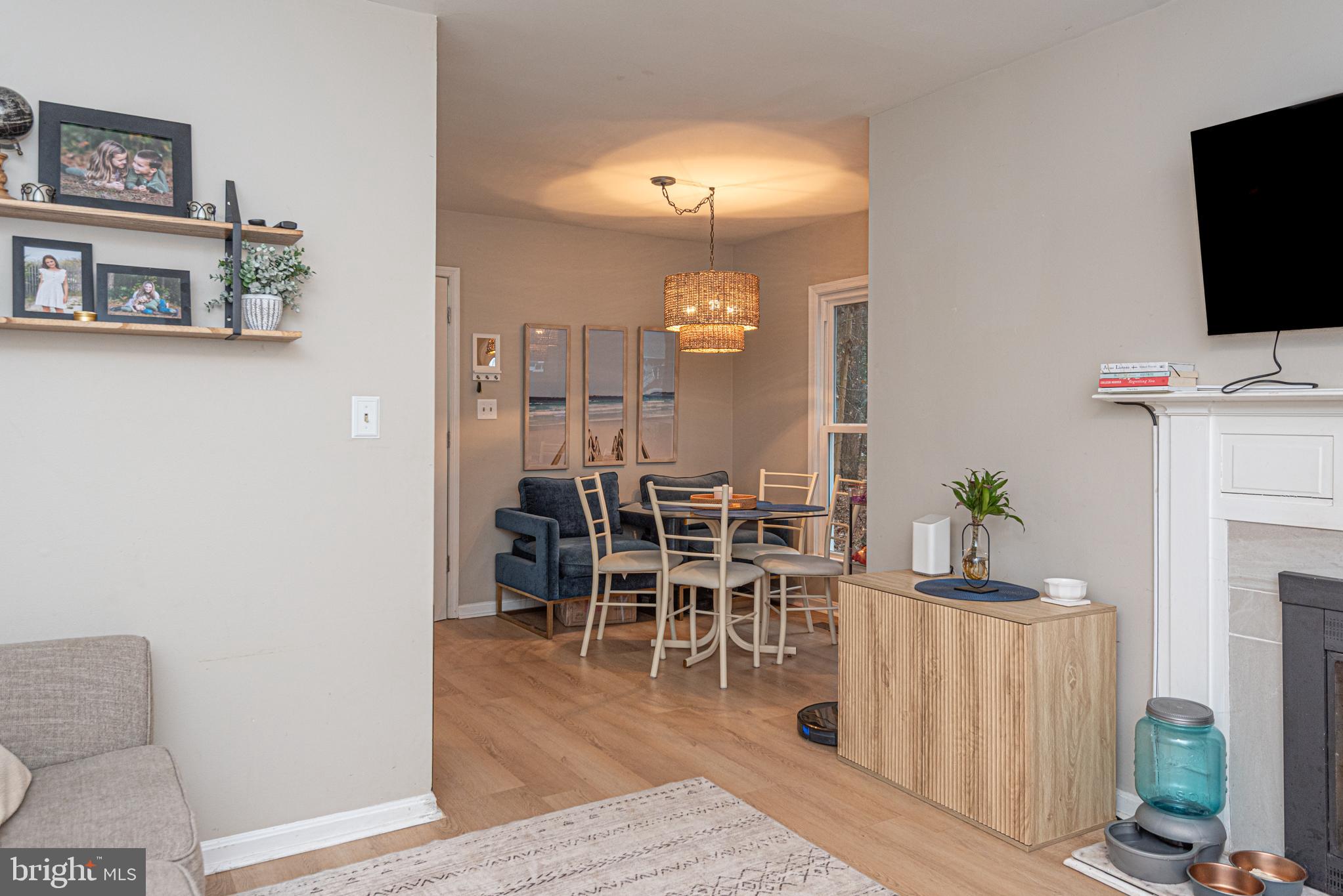 33 Liberty Street Ocean Pines, MD 21811 - Photo 7 of 30 a living room with furniture a fireplace and a flat screen tv