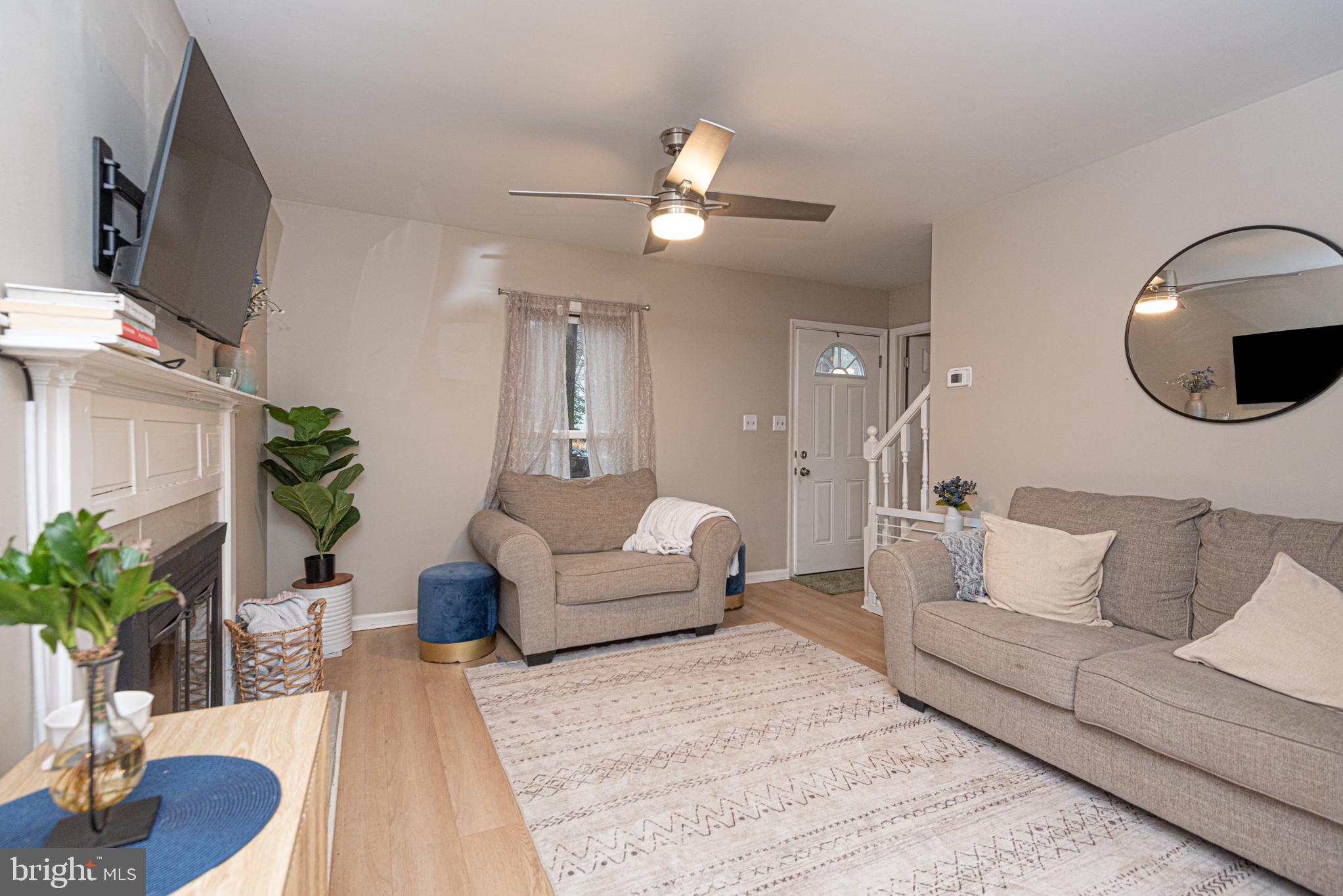 33 Liberty Street Ocean Pines, MD 21811 - Photo 9 of 30 a living room with furniture and a potted plant
